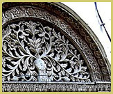 Intricately decorated Swahili doorways and arches are a prominent architectural feature of the Stone Town of Zanzibar UNESCO world heritage site, Tanzania